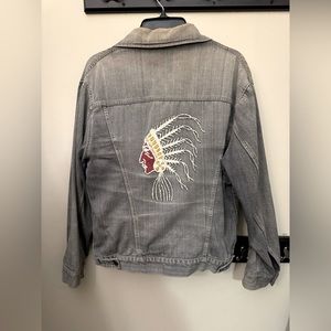 Vintage denim jacket with beaded design on back